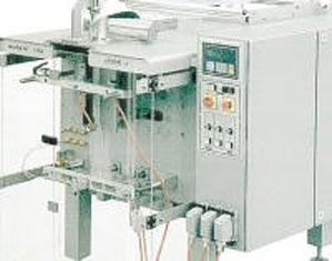 Bag forming, filling and sealing machine