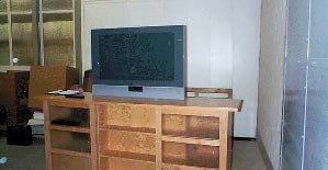 Sideboard with integrated TV lifting device