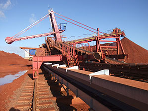 Paddle-wheel stockpiling unit