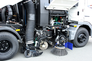 Detailed view of the mounted sweeper