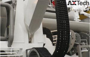 E-Chain® with reverse bend radius guides cable and hoses.