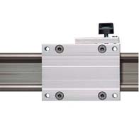 Hand clamp for carriage on linear guide