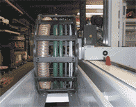 Feeding and de-stacking unit for wooden parts